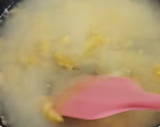 Add the bouillon cube (or powder), soy sauce, and pepper. Continue whisking until everything is well combined and starting to thicken.